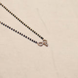 Infinity Design with Marquise Droplet Pendant With Black Beads
