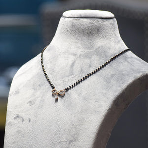 Infinity Design with Marquise Droplet Pendant With Black Beads