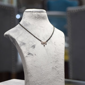 Infinity Design with Marquise Droplet Pendant With Black Beads