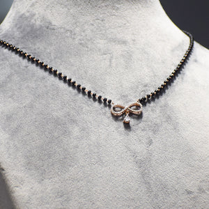 Infinity Design with Marquise Droplet Pendant With Black Beads