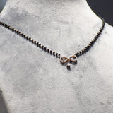 Infinity Design with Marquise Droplet Pendant With Black Beads